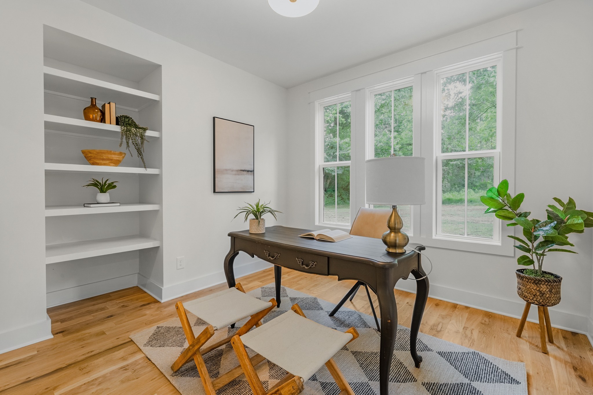 1629 Cairo Road Gallatin, TN 37066 - Photo 16 of 61 a view of a workspace with furniture window and wooden floor