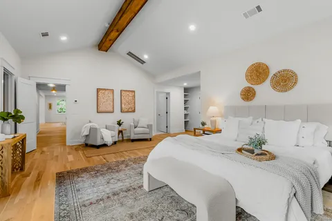 a view of a swimming pool with an outdoor space and seating area