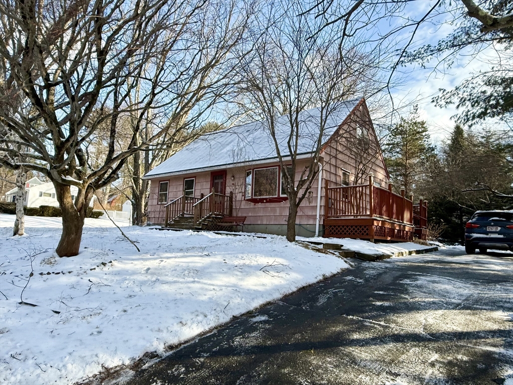 58 Arnold Road Sturbridge, MA 01518 - Photo 1 of 25 a view of a house with snow on the road