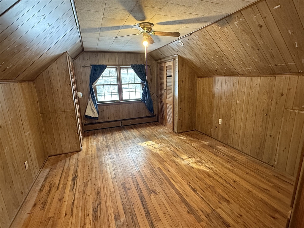 58 Arnold Road Sturbridge, MA 01518 - Photo 19 of 25 a view of empty room with wooden floor and fan