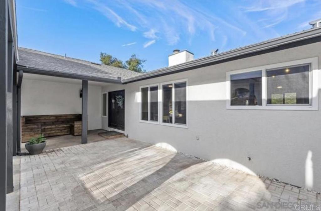 3340 Skytrail Ranch Road Jamul, CA 91935 - Photo 11 of 42 a view of a house with a backyard