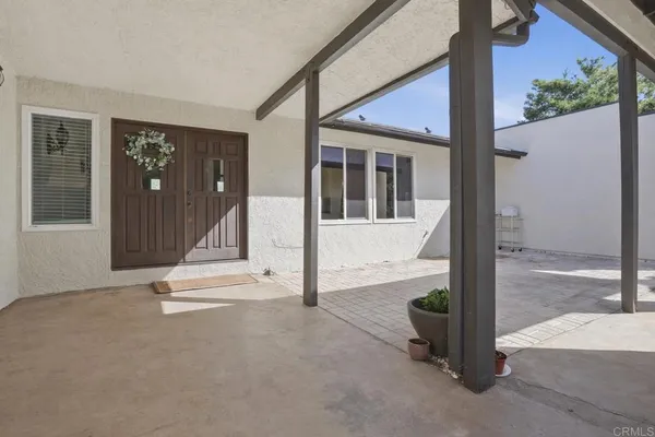 a view of a entryway door front of house