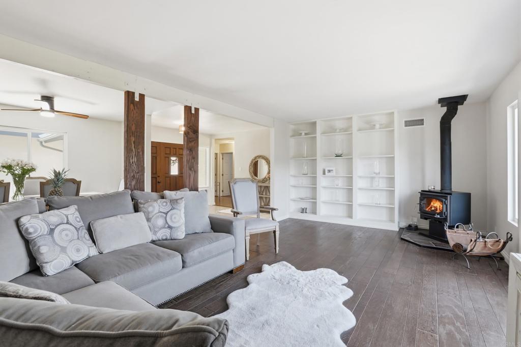 3340 Skytrail Ranch Road Jamul, CA 91935 - Photo 17 of 42 a living room with furniture and a large window