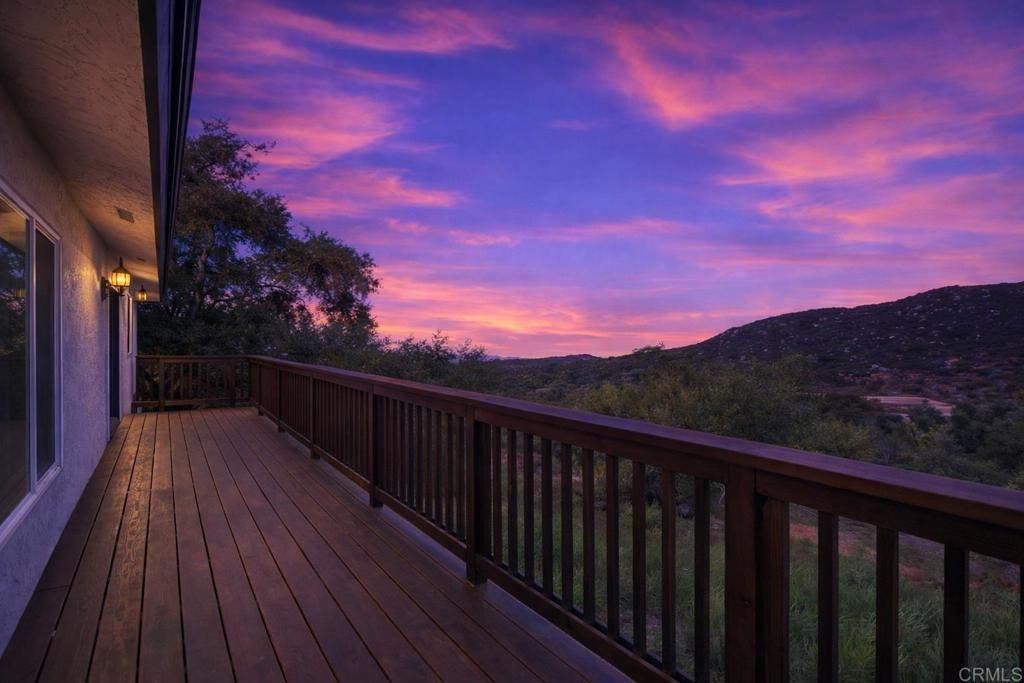 3340 Skytrail Ranch Road Jamul, CA 91935 - Photo 10 of 42 a balcony with wooden floor and city view