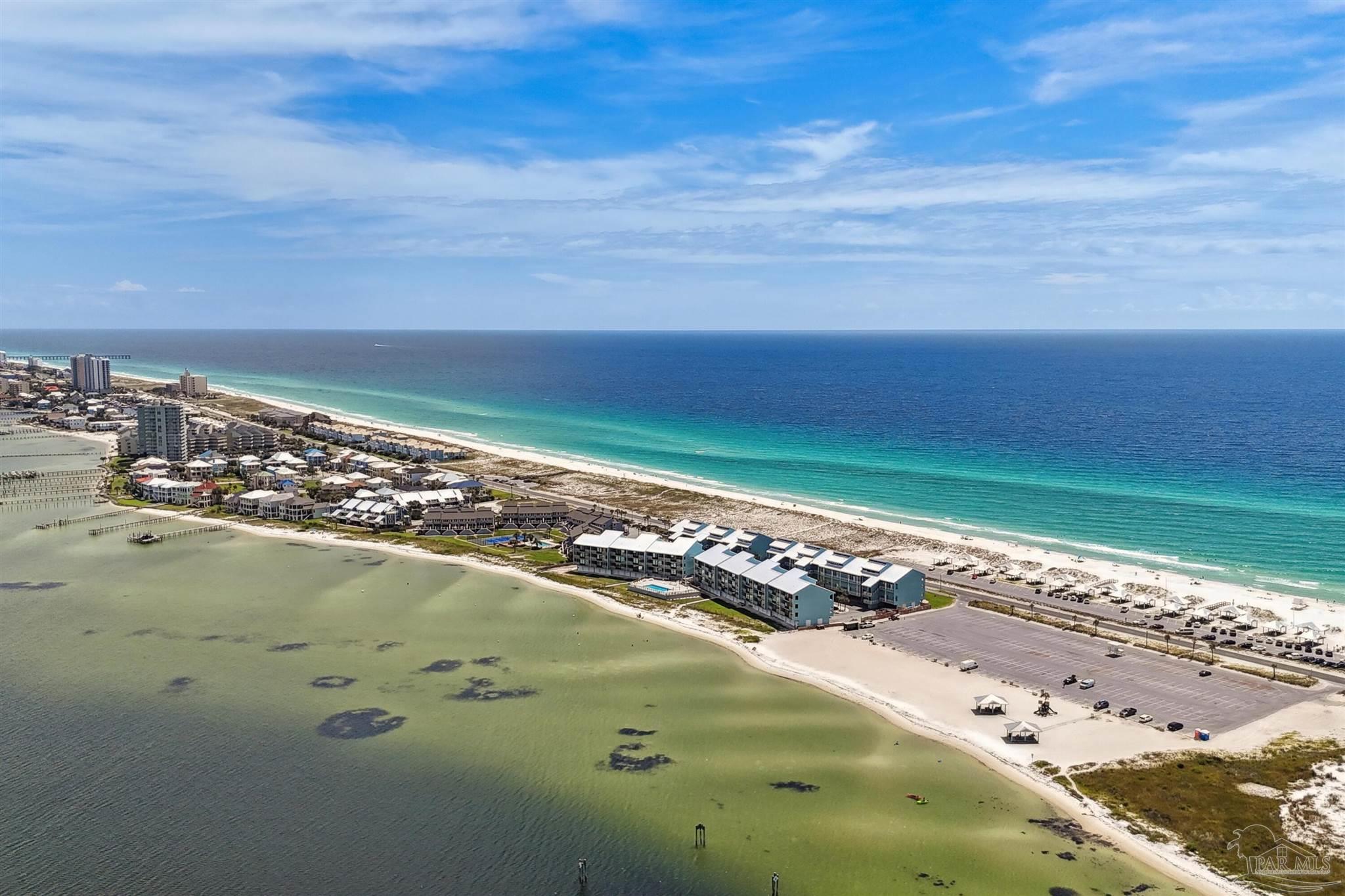 1390 Fort Pickens Road, Unit 229 Pensacola Beach, FL 32561 - Photo 2 of 47 a view of an ocean beach