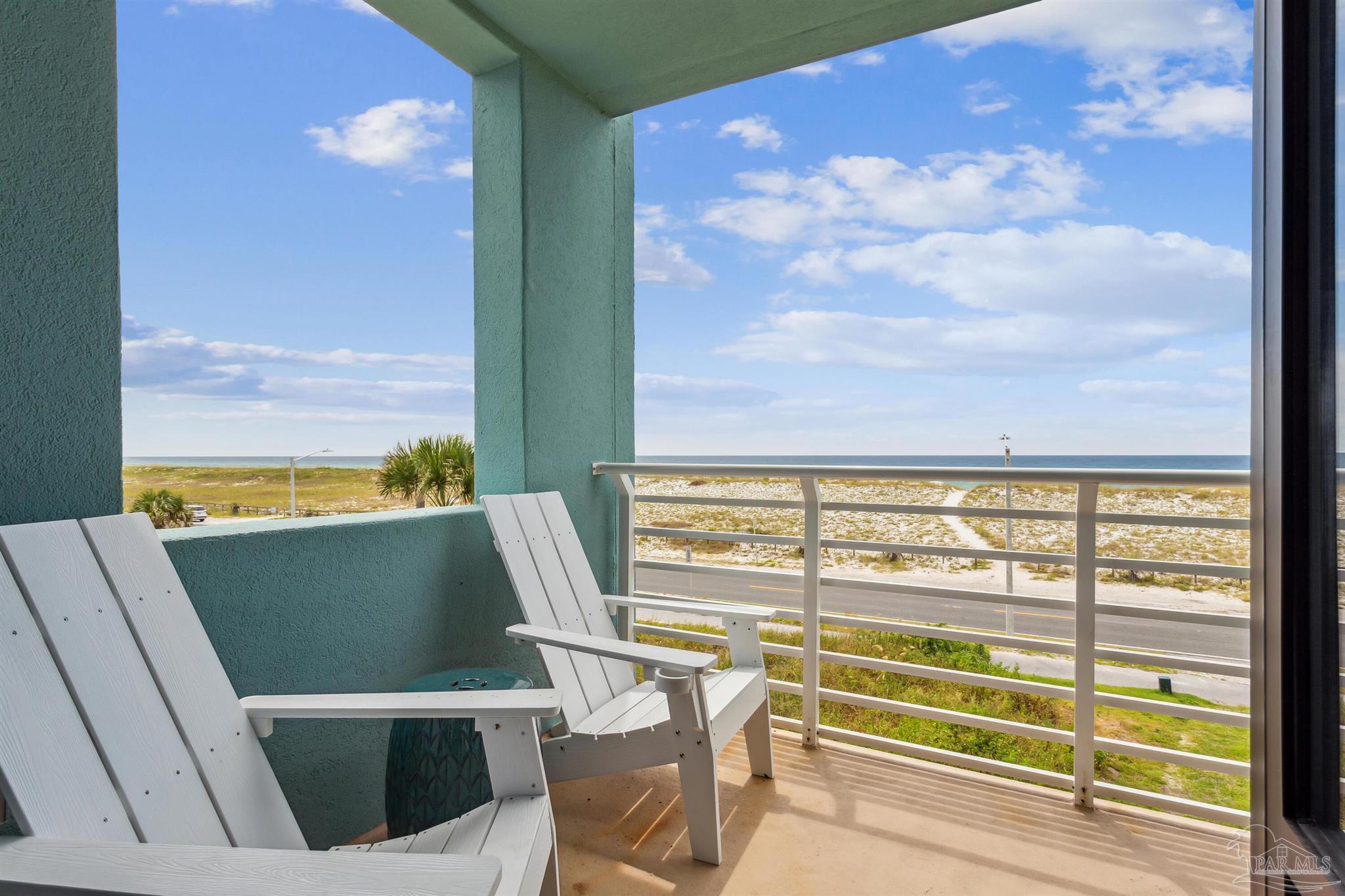 1390 Fort Pickens Road, Unit 229 Pensacola Beach, FL 32561 - Photo 21 of 47 a view of a city from a terrace