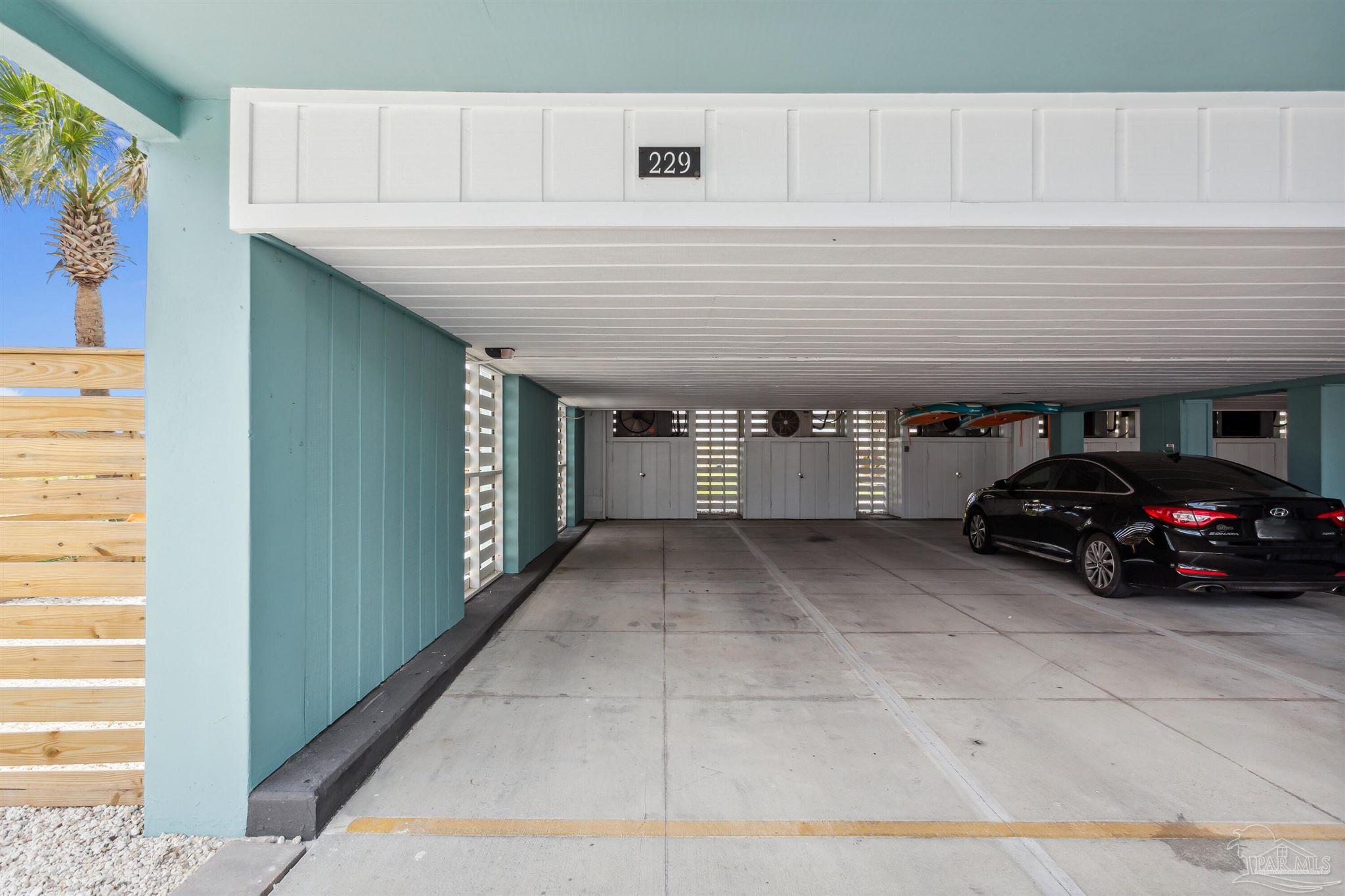 1390 Fort Pickens Road, Unit 229 Pensacola Beach, FL 32561 - Photo 30 of 47 a view of a garage