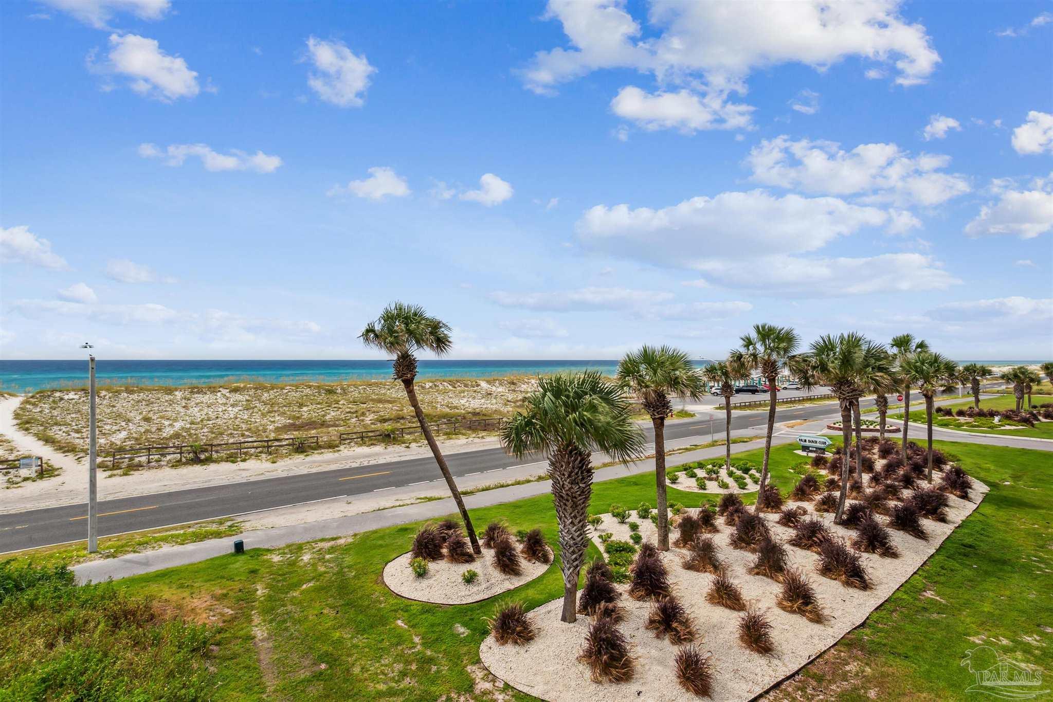 1390 Fort Pickens Road, Unit 229 Pensacola Beach, FL 32561 - Photo 44 of 47 a view of a balcony with lake view and a ocean view