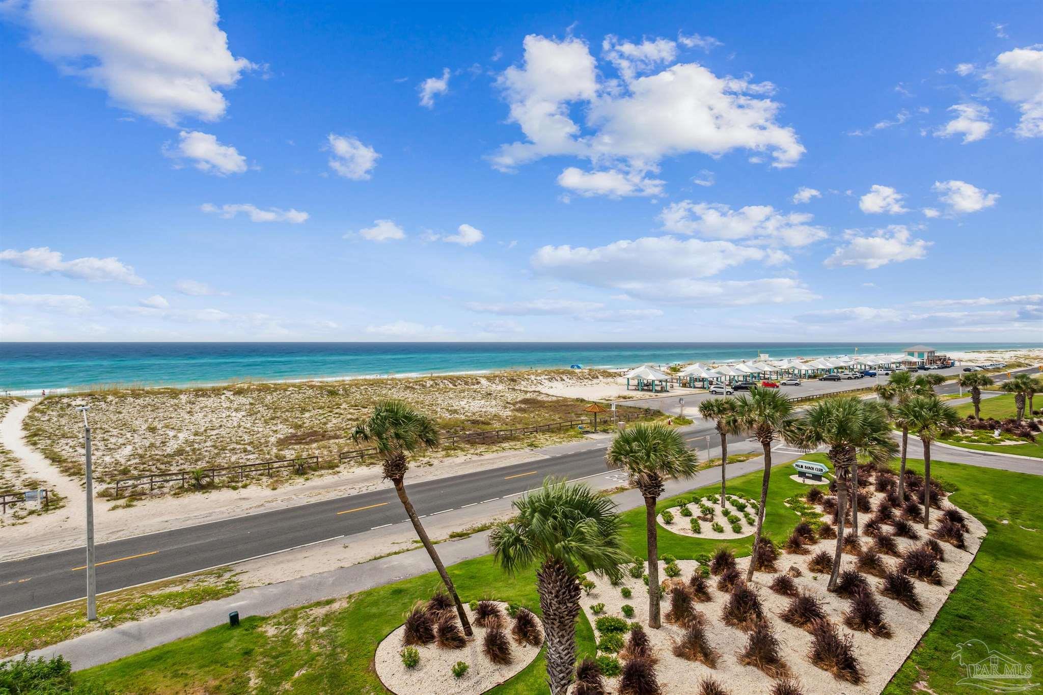 1390 Fort Pickens Road, Unit 229 Pensacola Beach, FL 32561 - Photo 47 of 47 a view of a balcony with an ocean view