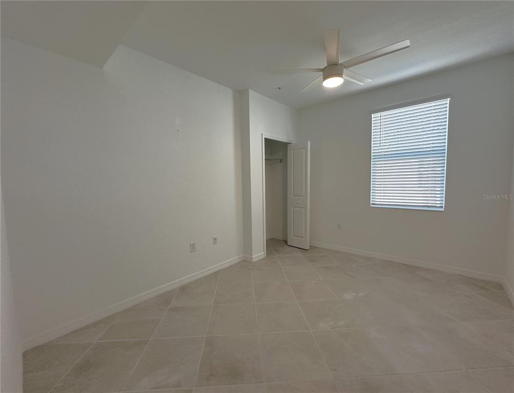 14149 Poppy Field Loop, Unit 6012 Punta Gorda, FL 33950 - Photo 17 of 49 an empty room with windows