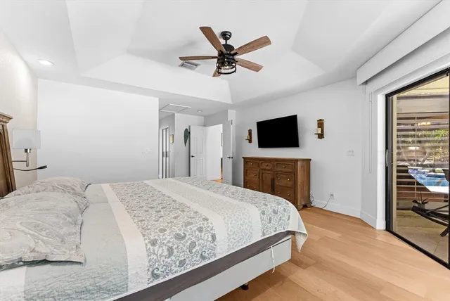 a bathroom with double vanity and a mirror