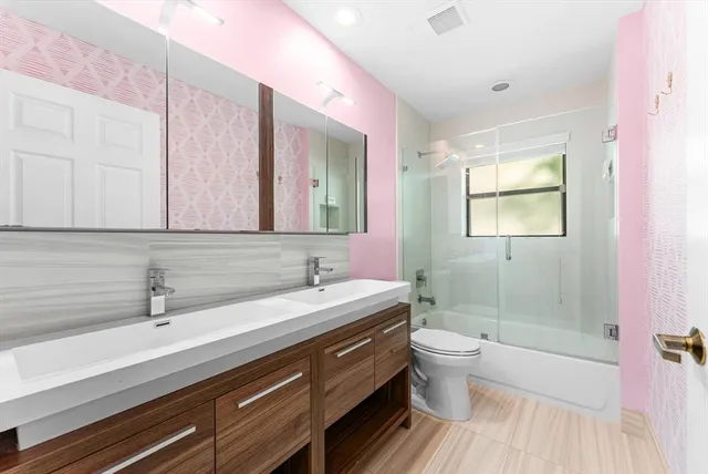 a bedroom with a workspace