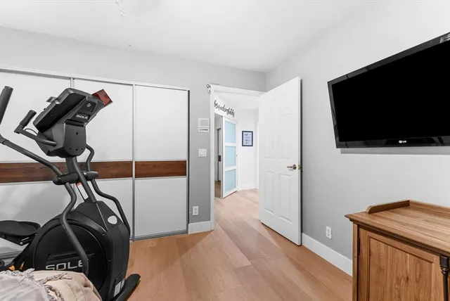 a utility room with sink dryer and washer