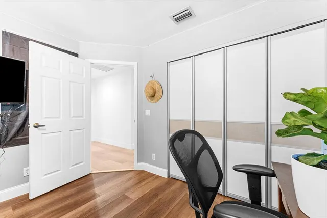 a view of swimming pool with seating area and furniture