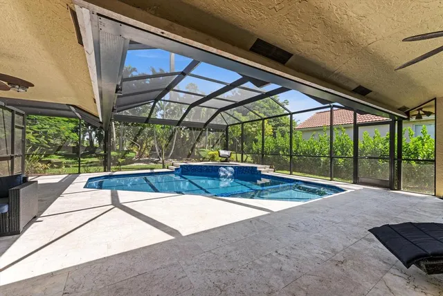 a view of a two chairs in a yard