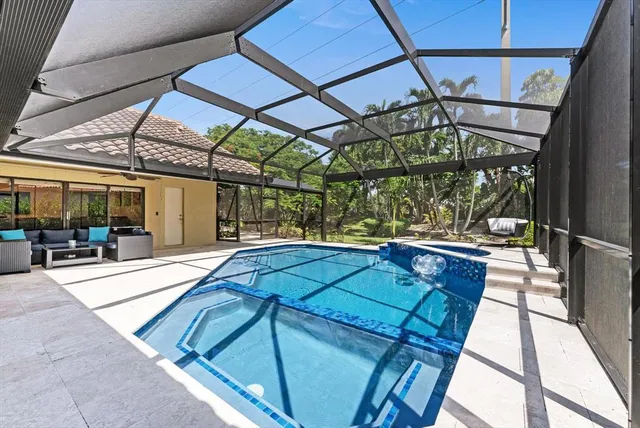 a view of a backyard with plants