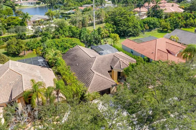 an aerial view of city and lake