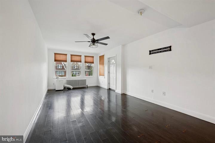 2467 79th Avenue, Unit 1 Philadelphia, PA 19150 - Photo 2 of 16 wooden floor in an empty room with a window