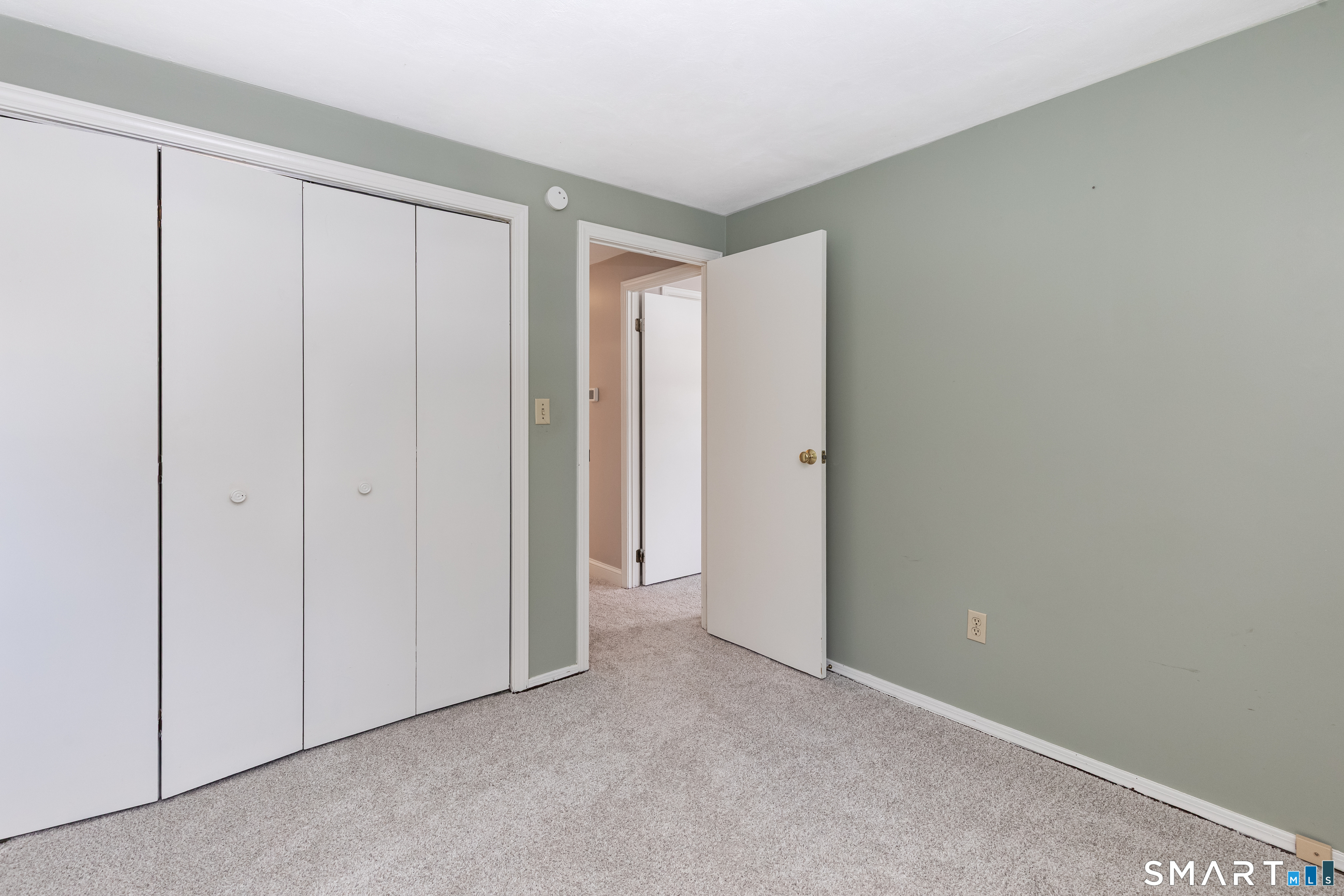 10 Apple Tree Road Bethel, CT 06801 - Photo 20 of 32 a view of an empty room and closet