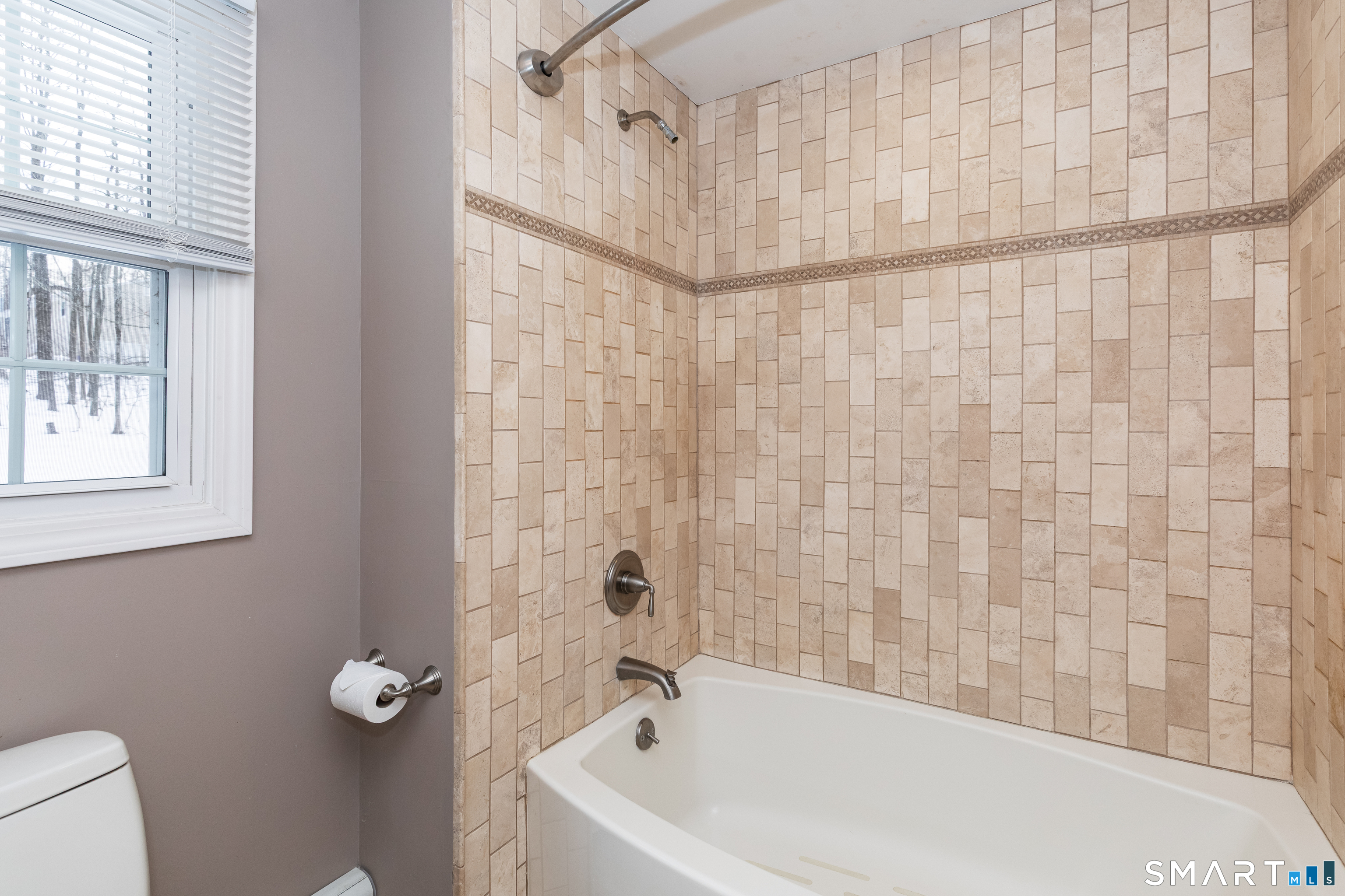 10 Apple Tree Road Bethel, CT 06801 - Photo 22 of 32 a bathroom with a bathtub and shower