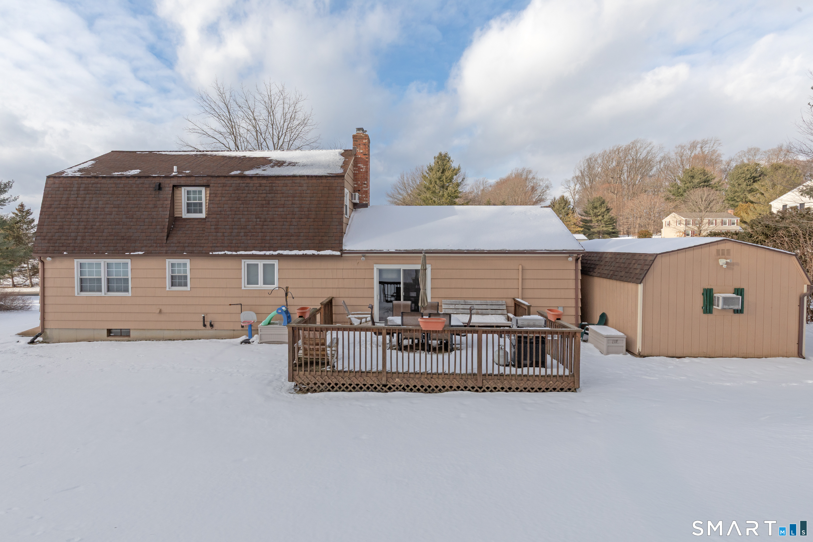 10 Apple Tree Road Bethel, CT 06801 - Photo 29 of 32 front view of house with deck and seating space