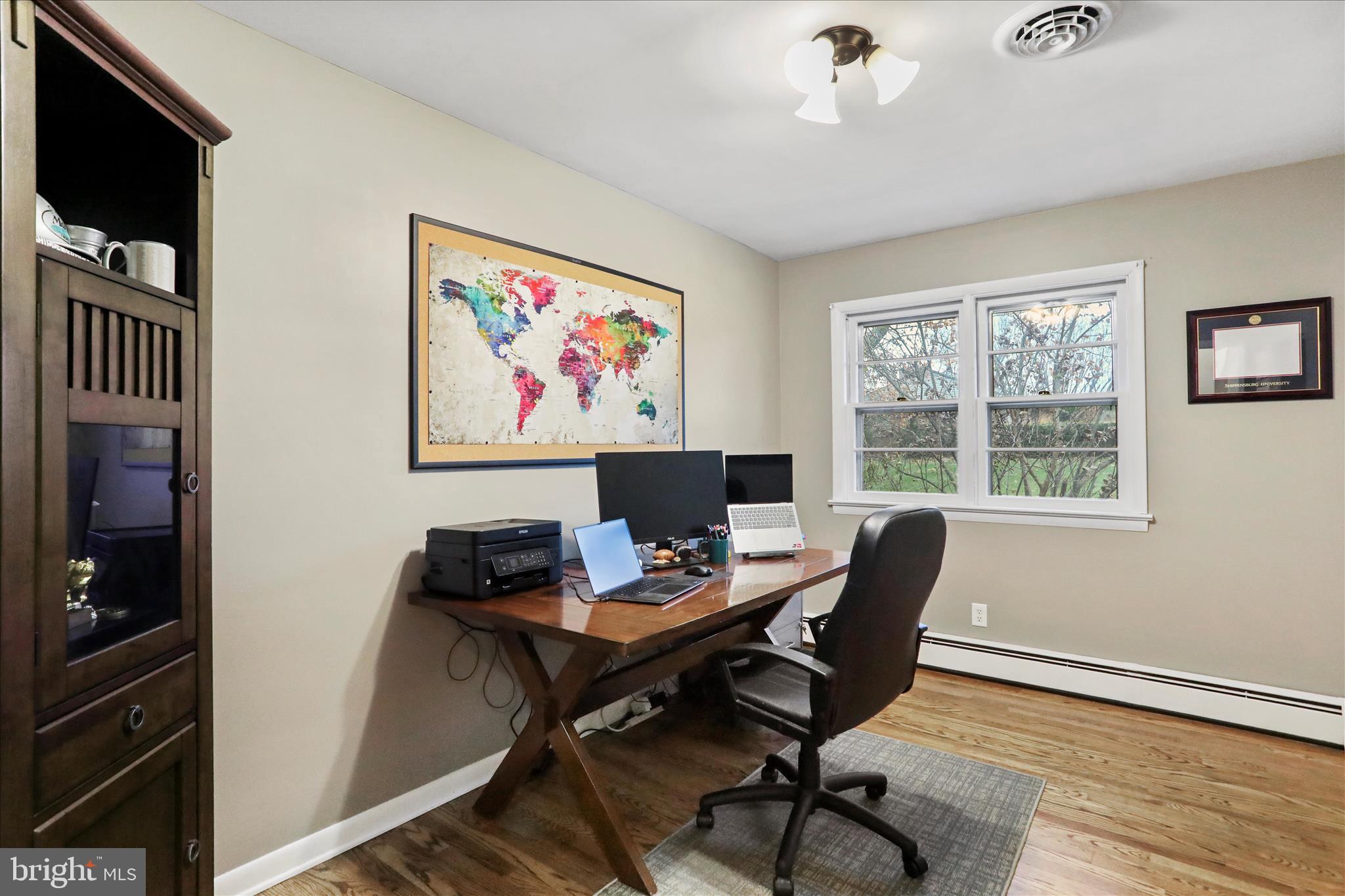 13347 Keener Road Hagerstown, MD 21742 - Photo 15 of 44 a view of a workspace with furniture and a window
