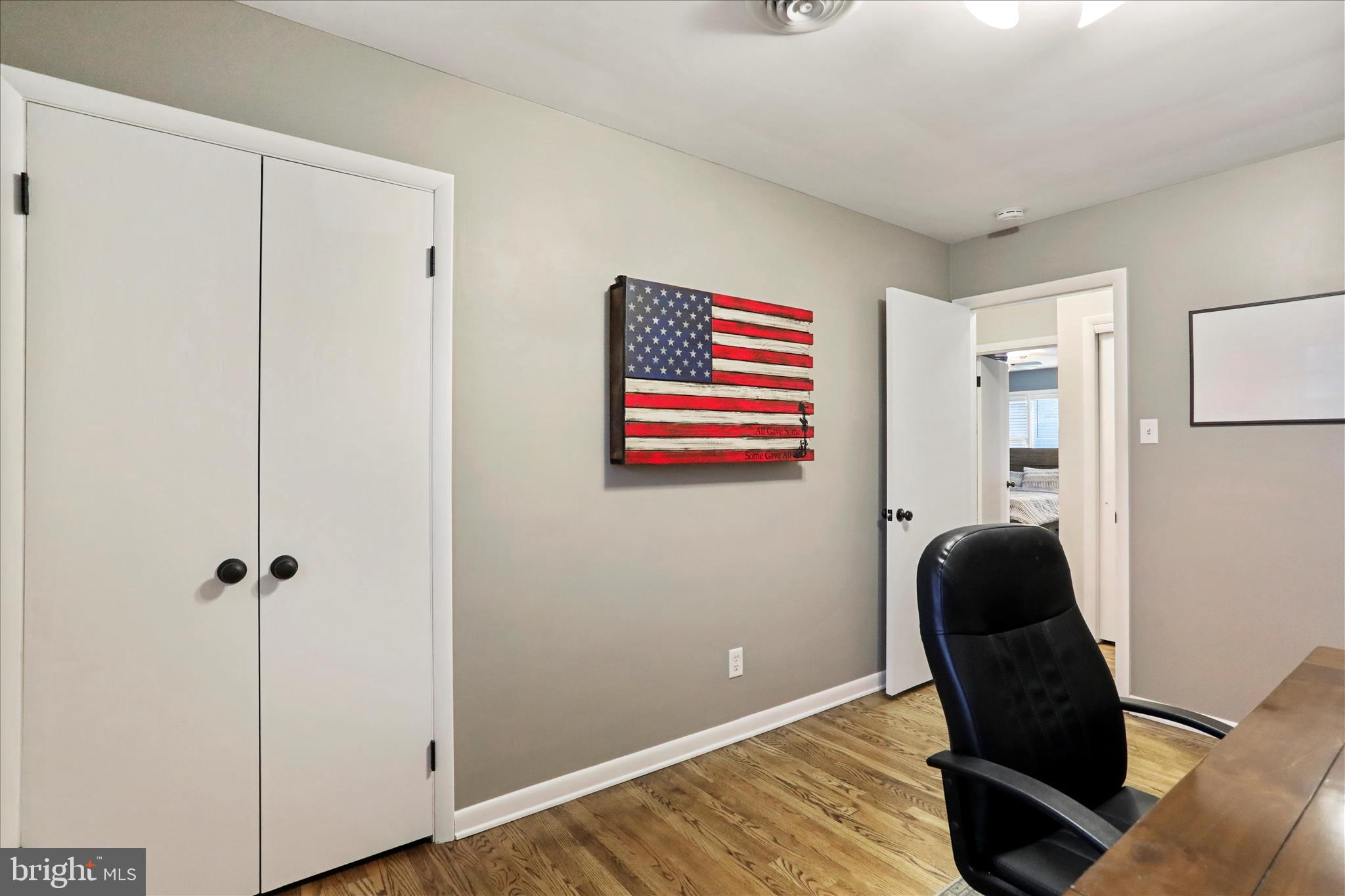 13347 Keener Road Hagerstown, MD 21742 - Photo 16 of 44 a room with a chair and a wooden floor