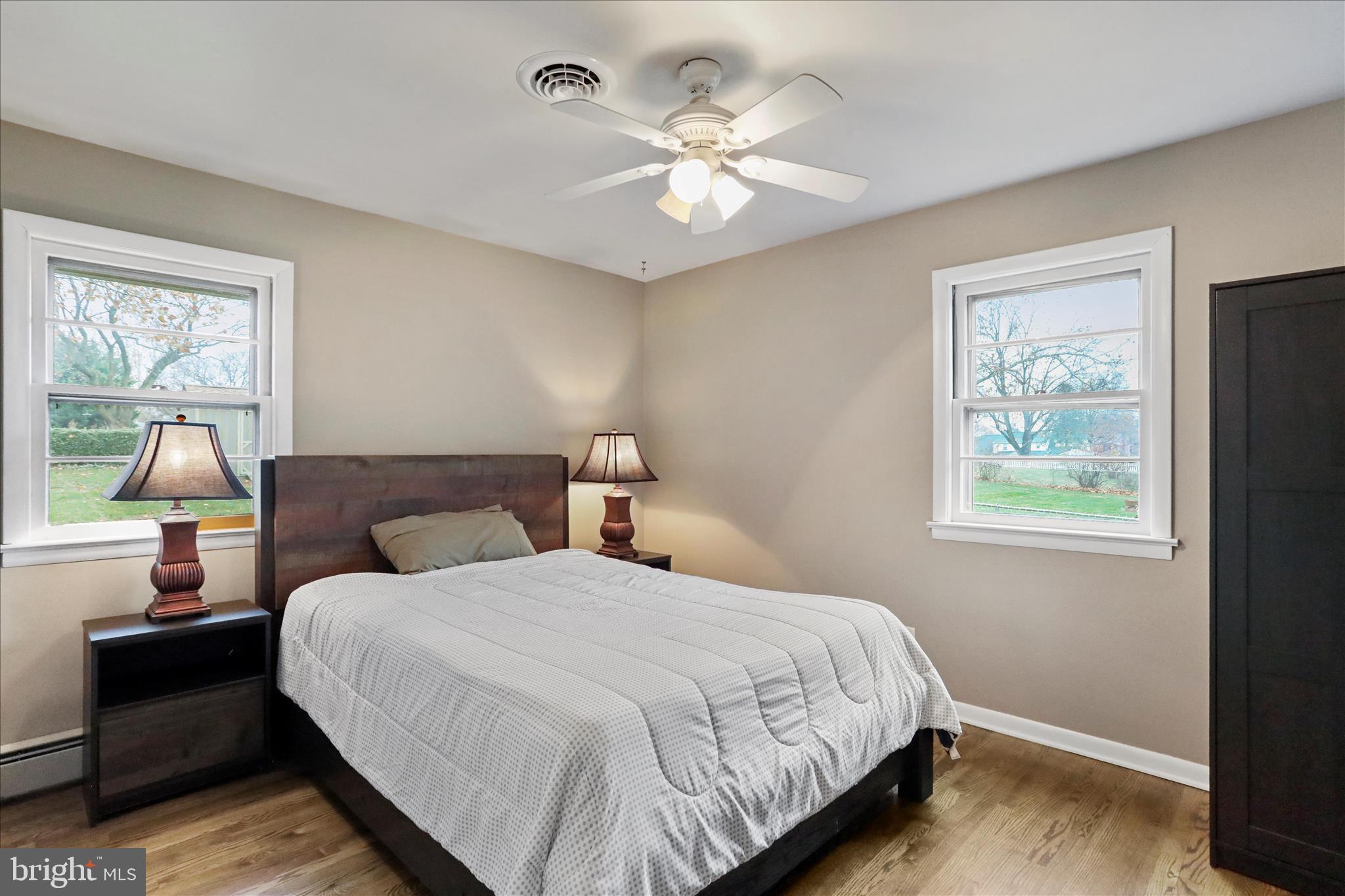 13347 Keener Road Hagerstown, MD 21742 - Photo 17 of 44 a bedroom with a bed and a chandelier