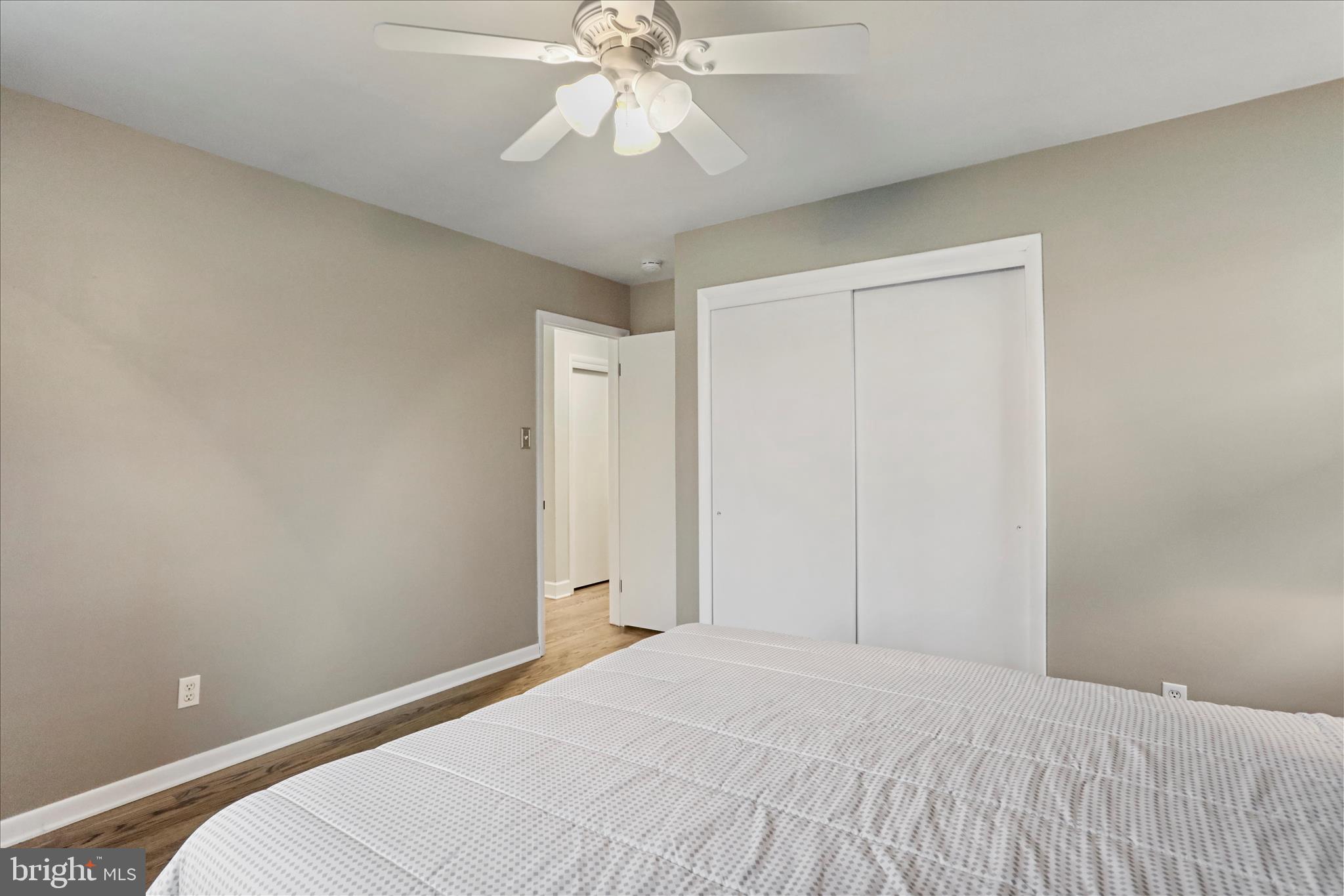 13347 Keener Road Hagerstown, MD 21742 - Photo 18 of 44 a bedroom with a bed and a chandelier