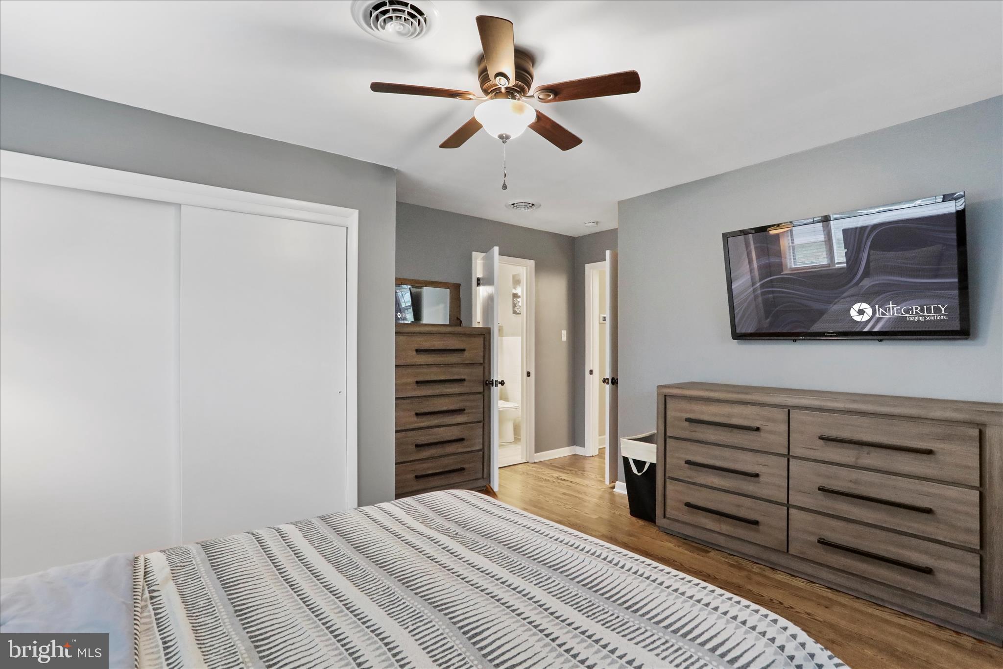 13347 Keener Road Hagerstown, MD 21742 - Photo 22 of 44 a bedroom with a bed and a chandelier