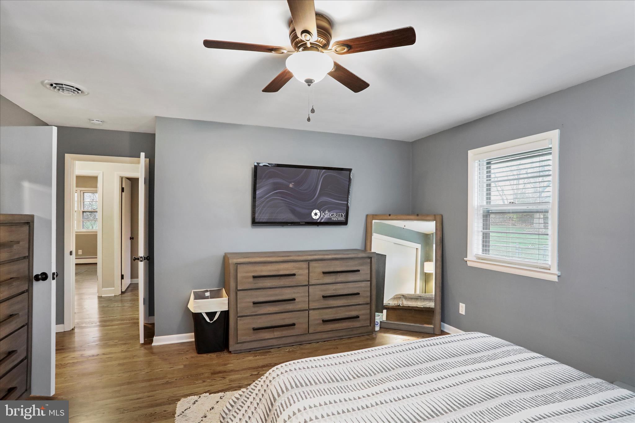 13347 Keener Road Hagerstown, MD 21742 - Photo 23 of 44 a bedroom with a bed and a chandelier
