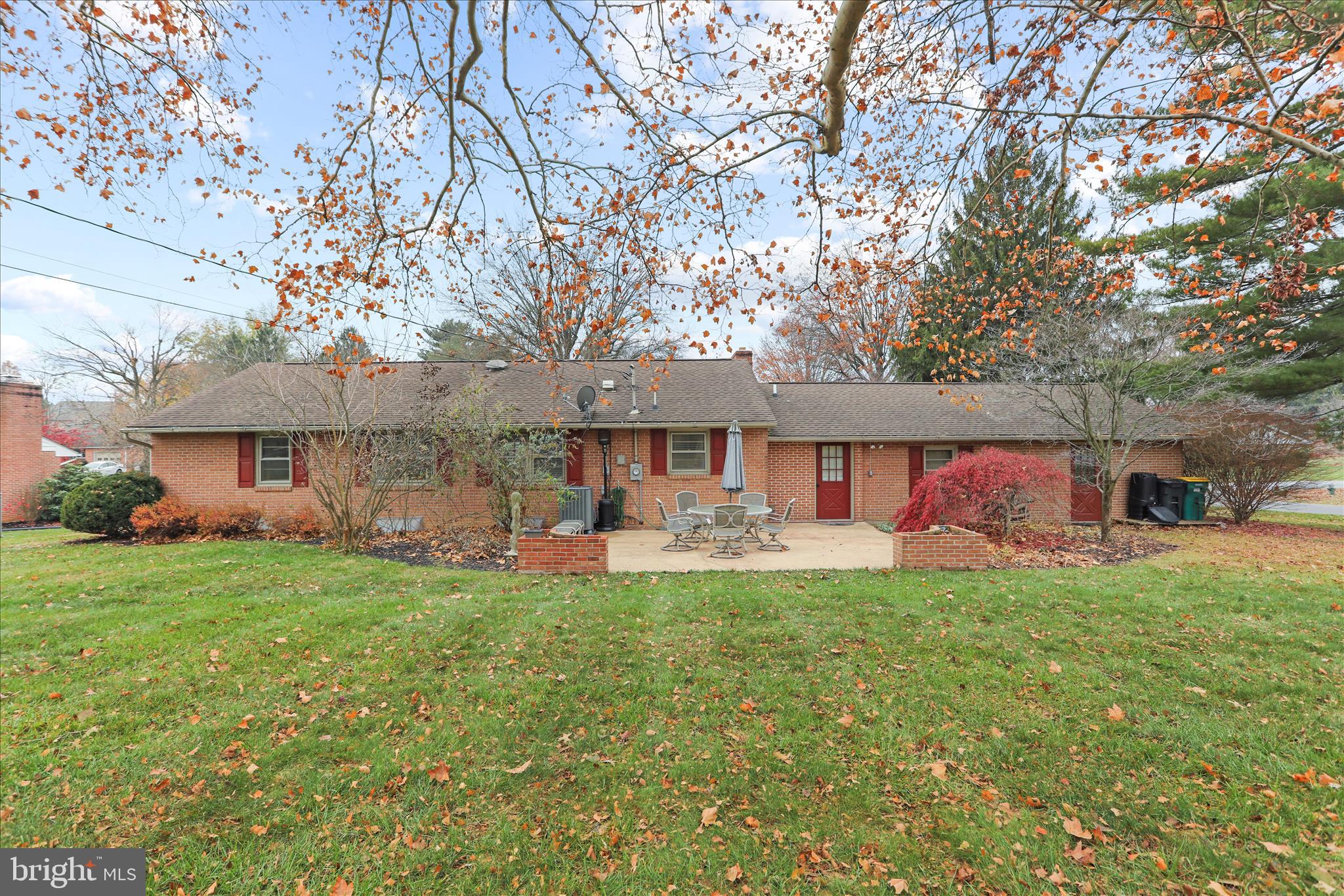 13347 Keener Road Hagerstown, MD 21742 - Photo 39 of 44 a front view of a house with a garden and trees