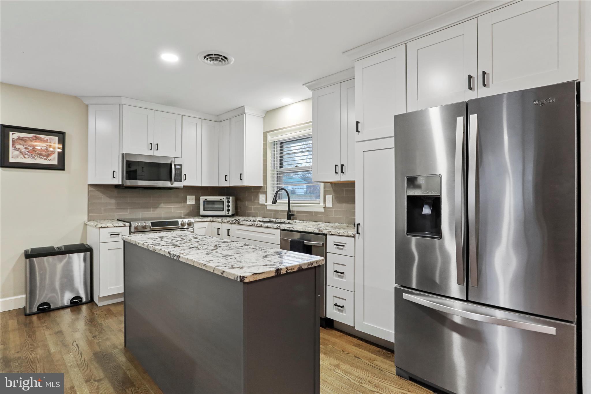 13347 Keener Road Hagerstown, MD 21742 - Photo 10 of 44 a kitchen with stainless steel appliances granite countertop a refrigerator stove microwave and sink