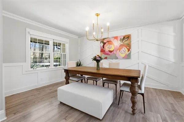 a view of a tables and chairs in a room