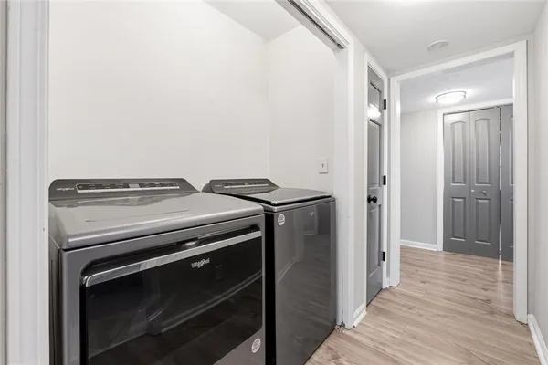 a kitchen with a stove and a refrigerator