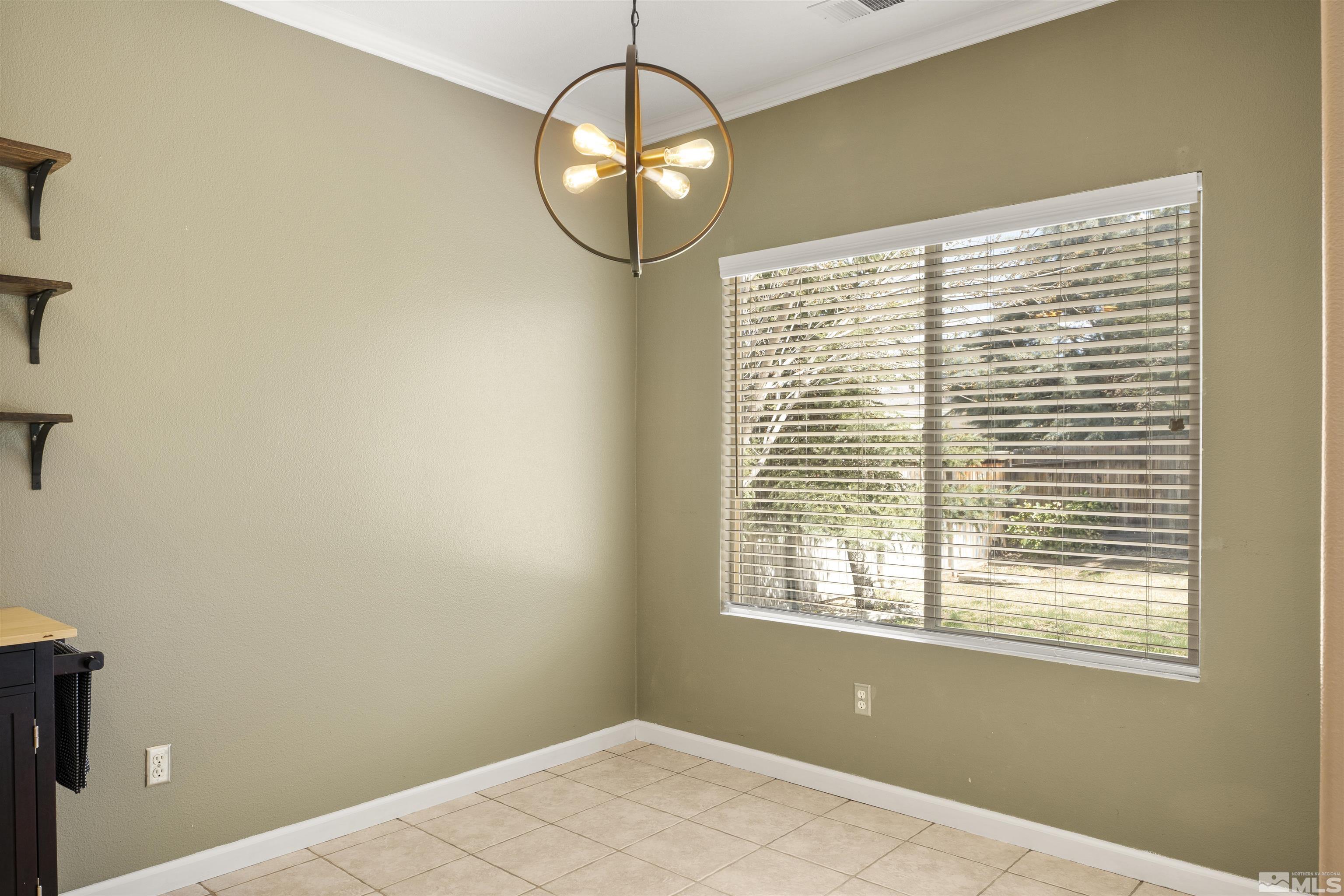 10200 Wolf Ridge Way Reno, NV 89521 - Photo 13 of 40 a view of a livingroom with a window