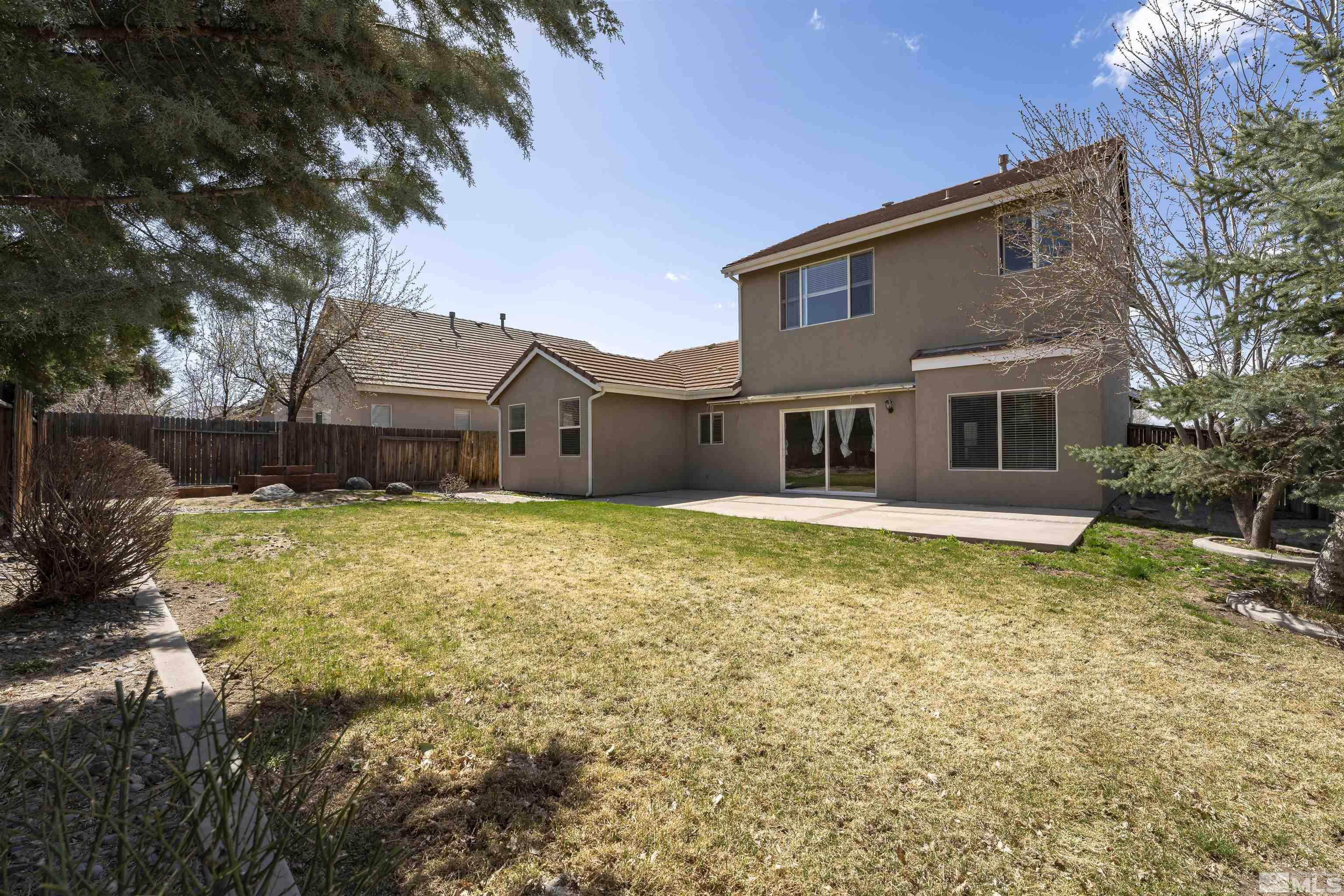 10200 Wolf Ridge Way Reno, NV 89521 - Photo 30 of 40 a house view with a outdoor space