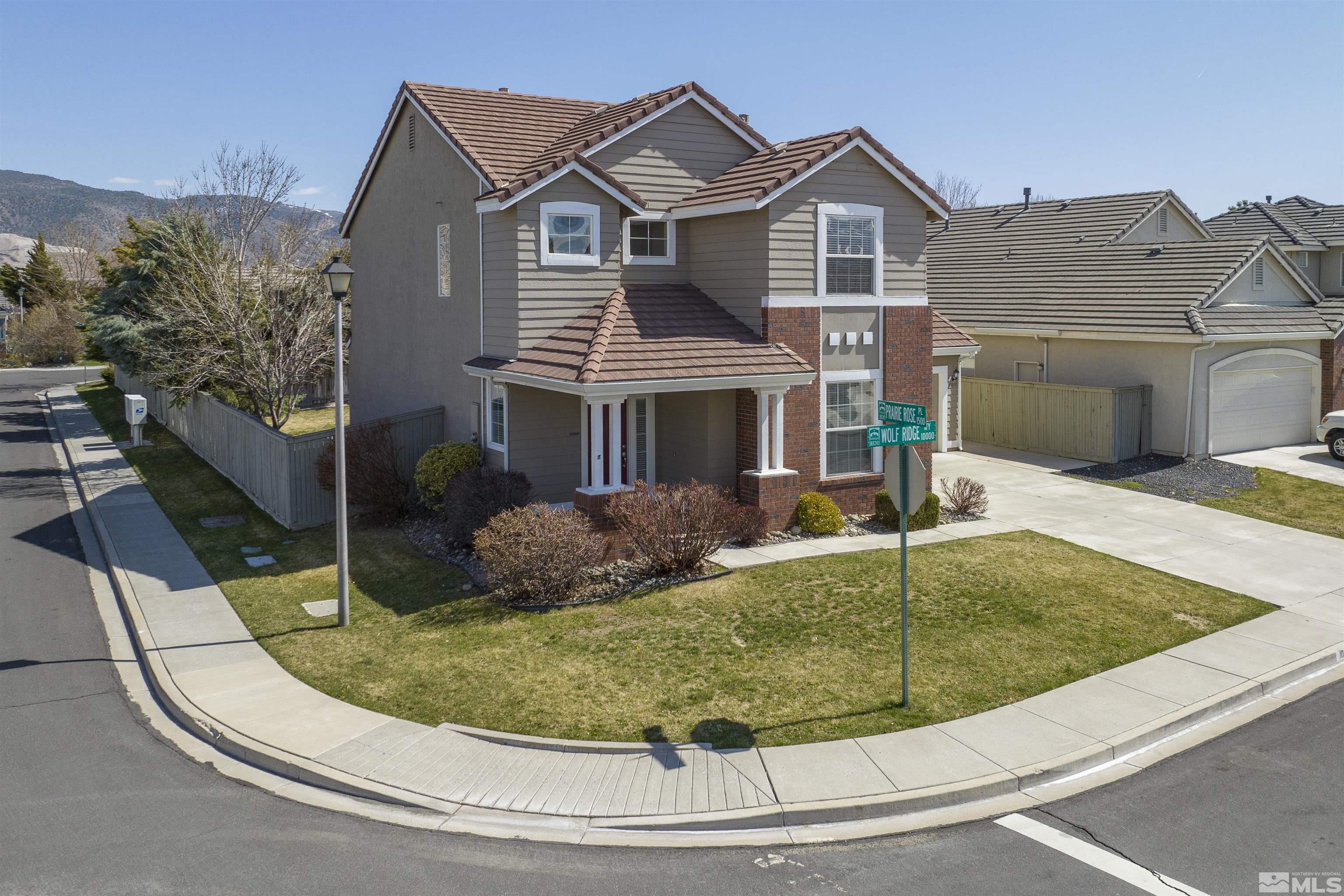 10200 Wolf Ridge Way Reno, NV 89521 - Photo 35 of 40 a view of a house with a sink and yard