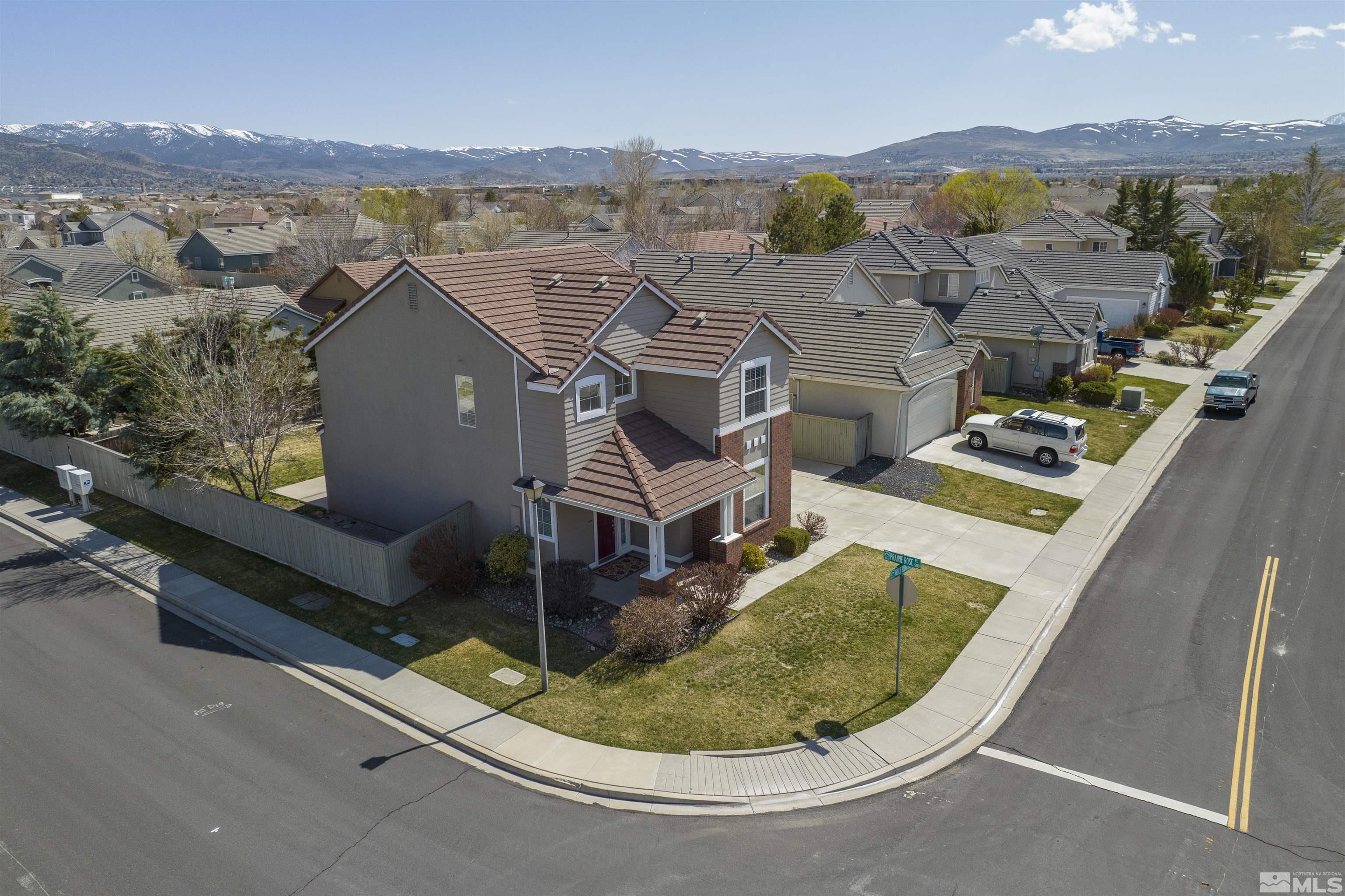 10200 Wolf Ridge Way Reno, NV 89521 - Photo 37 of 40 an aerial view of residential houses with outdoor space and river