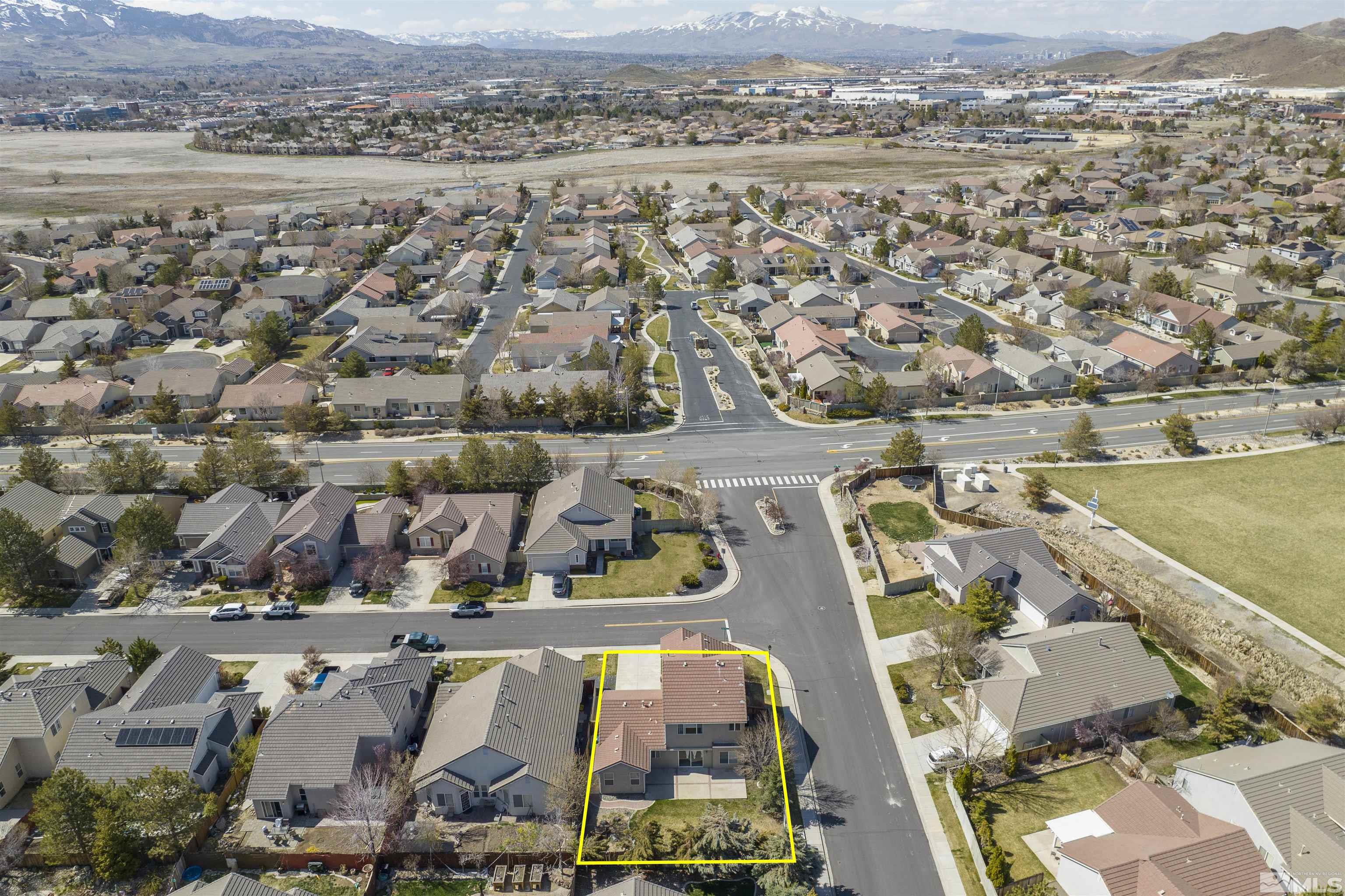 10200 Wolf Ridge Way Reno, NV 89521 - Photo 38 of 40 an aerial view of residential houses with outdoor space
