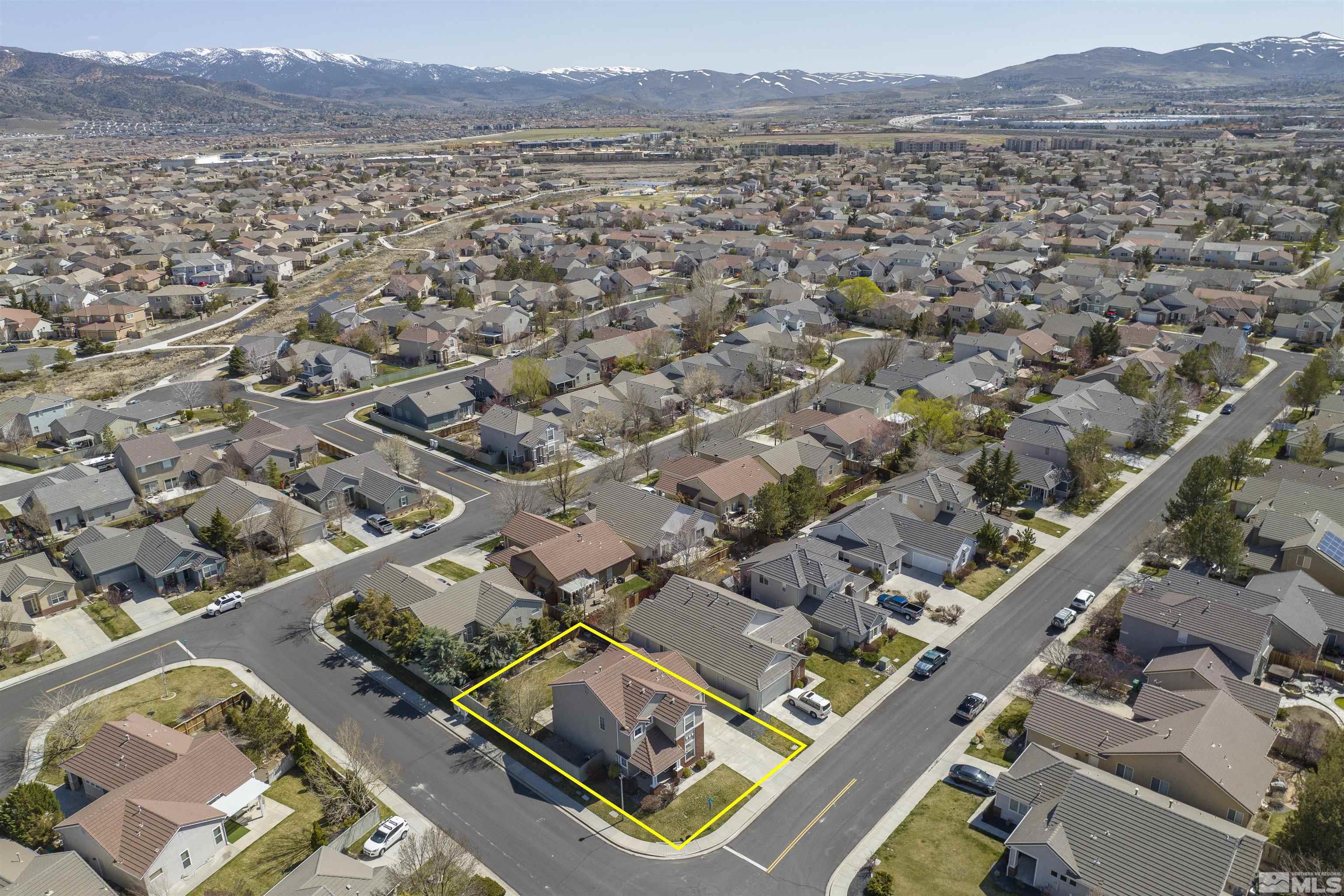 10200 Wolf Ridge Way Reno, NV 89521 - Photo 40 of 40 an aerial view of residential building and lake view