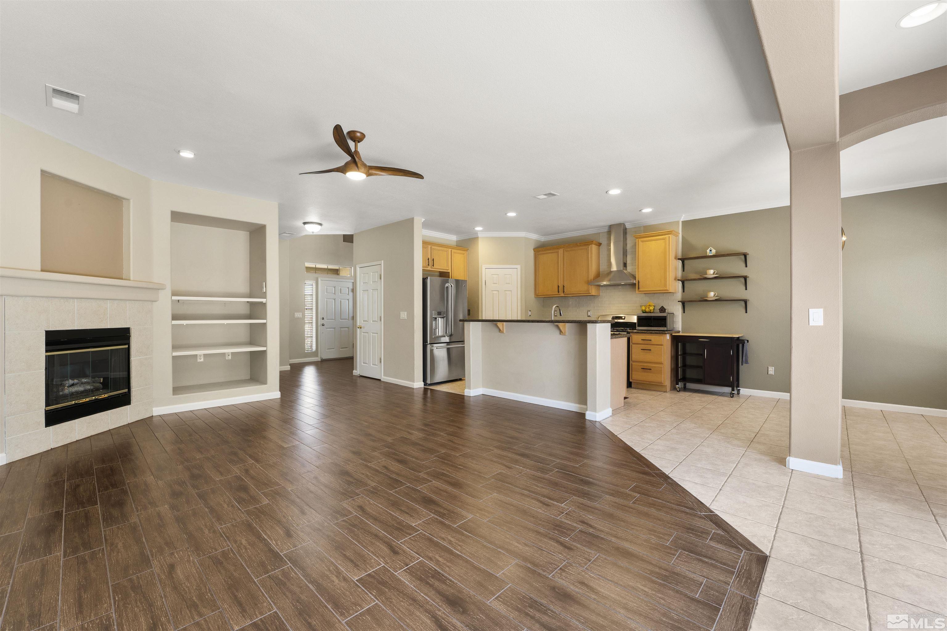 10200 Wolf Ridge Way Reno, NV 89521 - Photo 6 of 40 a view of a kitchen with a sink and a stove top oven