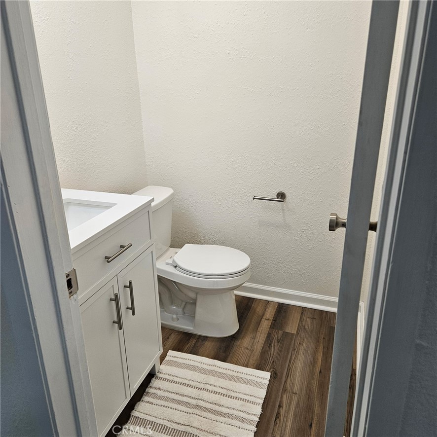 1051 Springfield Street, Unit C Upland, CA 91786 - Photo 13 of 14 a bathroom with a sink and a toilet