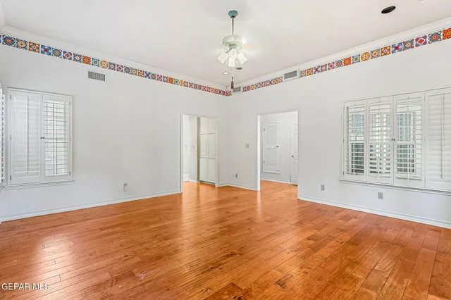 a view of an empty walk in closet