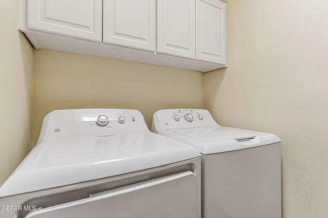 a view of a pathway both side of house