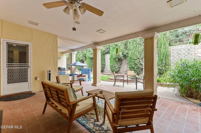a bath tub sitting in a bathroom next to a window