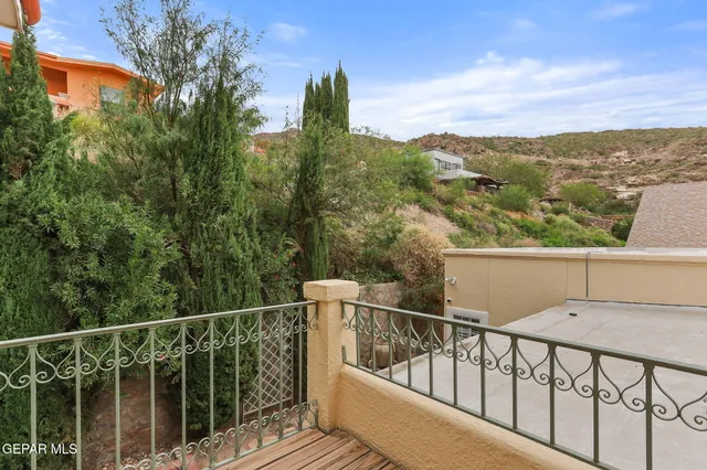 a balcony with an outdoor space