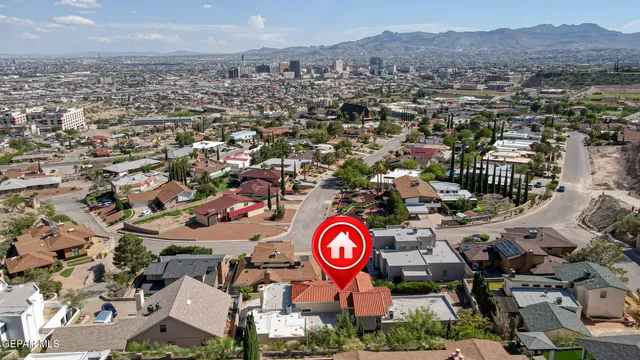 an aerial view of multi story residential apartment building with outdoor space