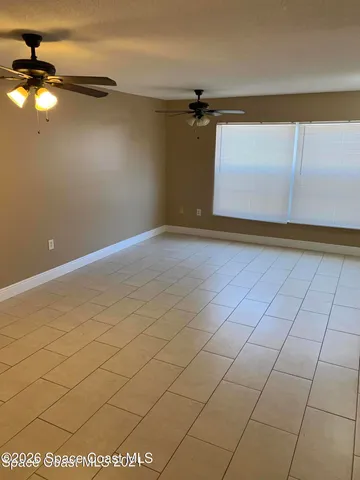 a view of a room with an empty space