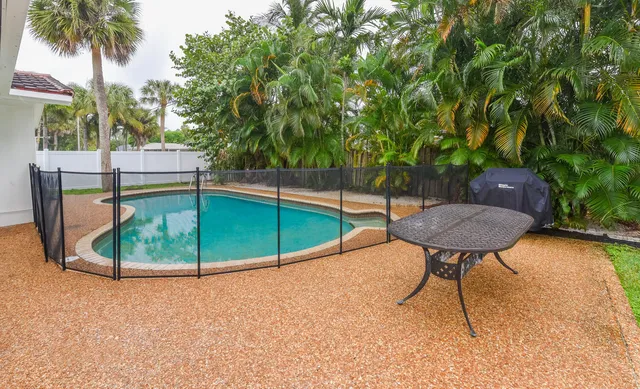 a garden view with a seating space